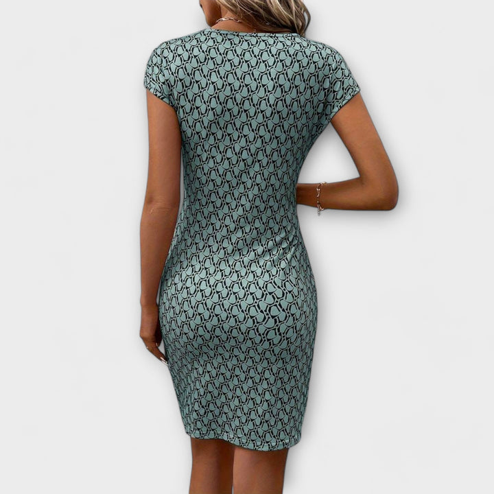 Emma | Vestido de manga corta con corte tulipa y estampado en toda la prenda