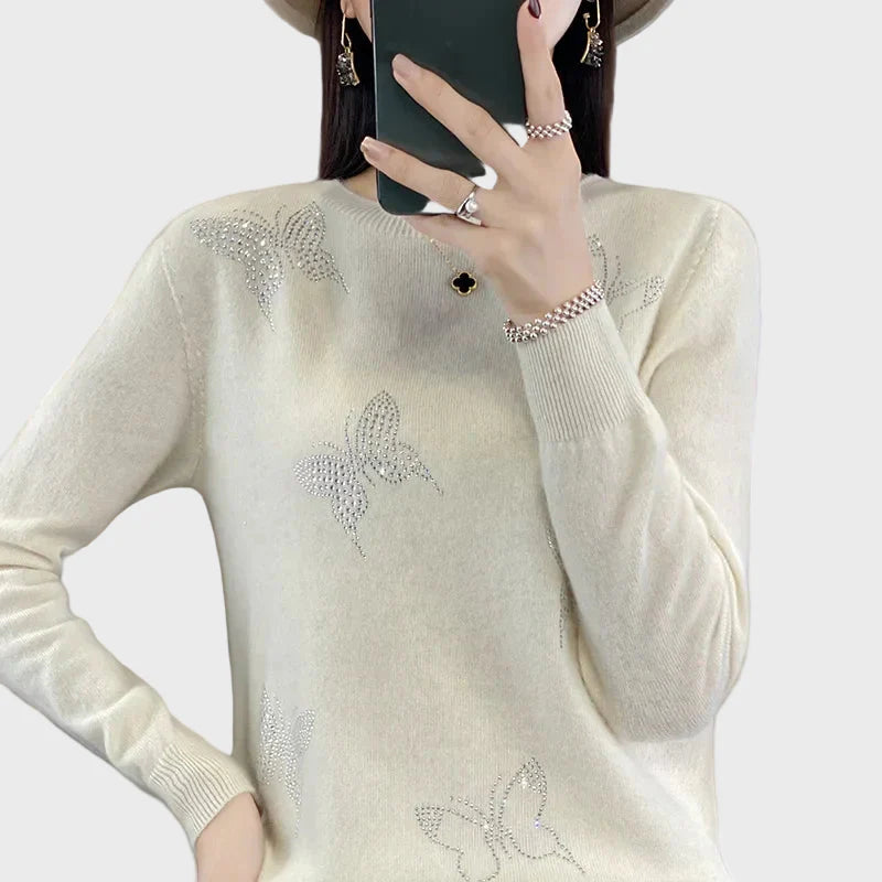 Cuello vuelto de punto con diseño de mariposa