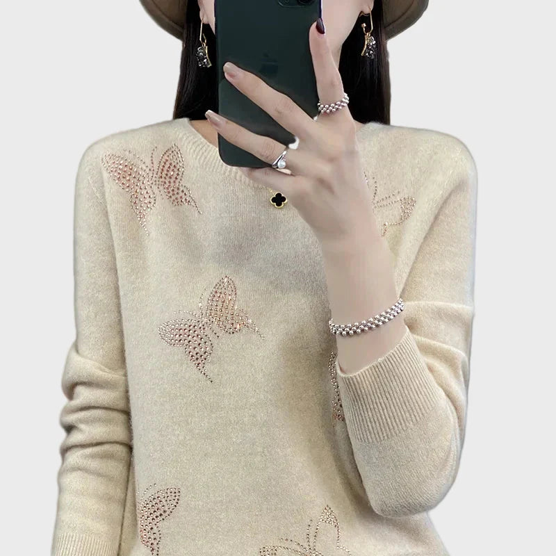 Cuello vuelto de punto con diseño de mariposa